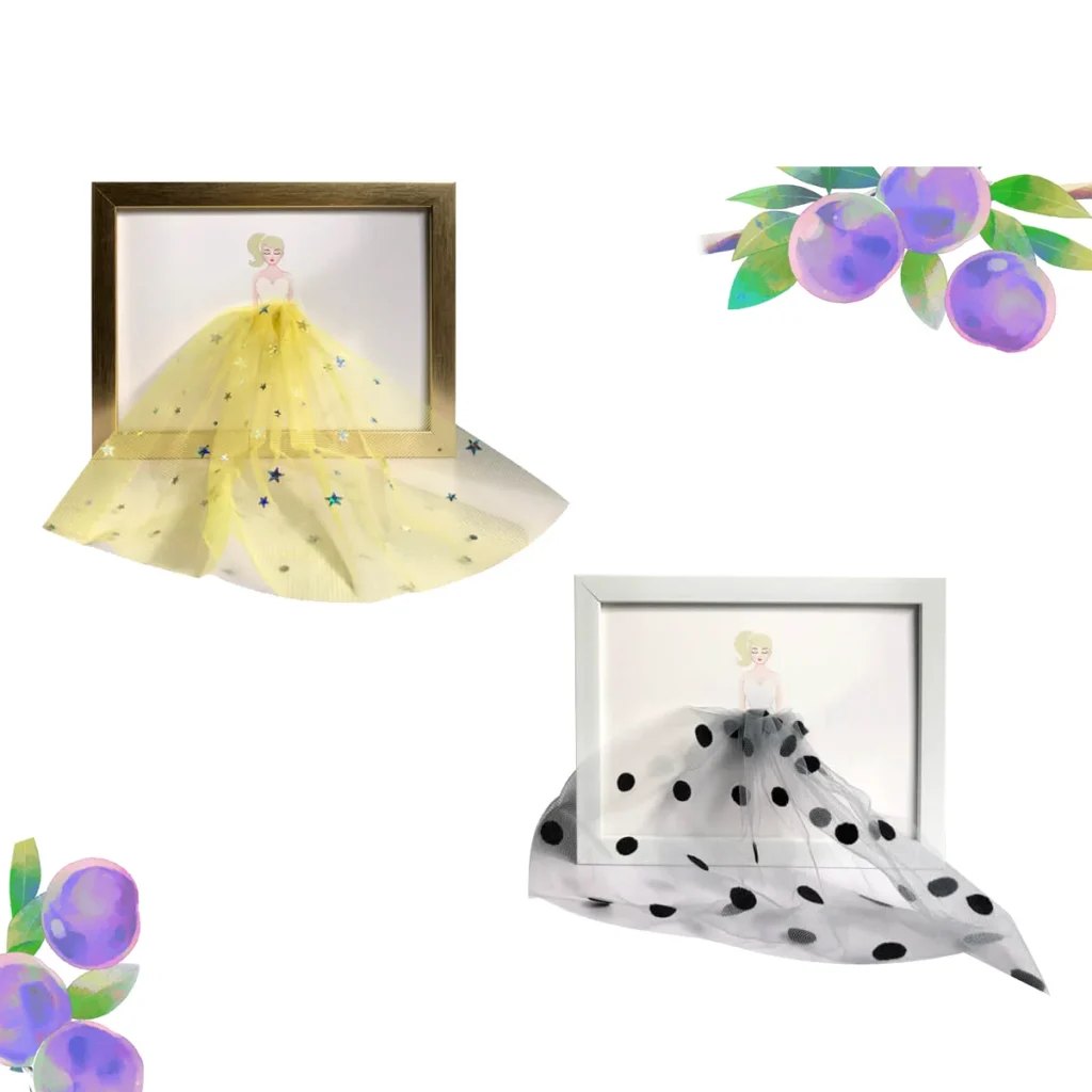 Decorative 3D framed art featuring a girl illustration with yellow and polka-dotted fabric dress design, complemented by watercolor fruit elements.