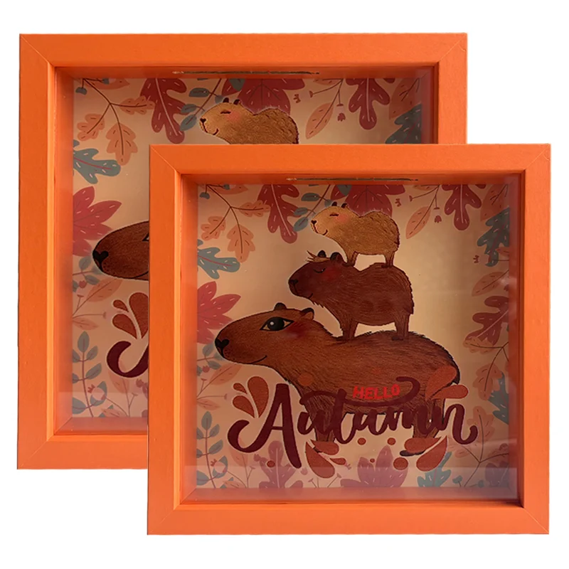 Two orange photo frames featuring a whimsical autumn design with colorful leaves and illustrated animals.