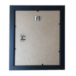 Back view of a black photo frame showing the MDF backboard and metal mounting hooks.