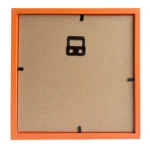 Back view of an orange photo frame with MDF backing, black corners, and a metal hanging hook for wall mounting.