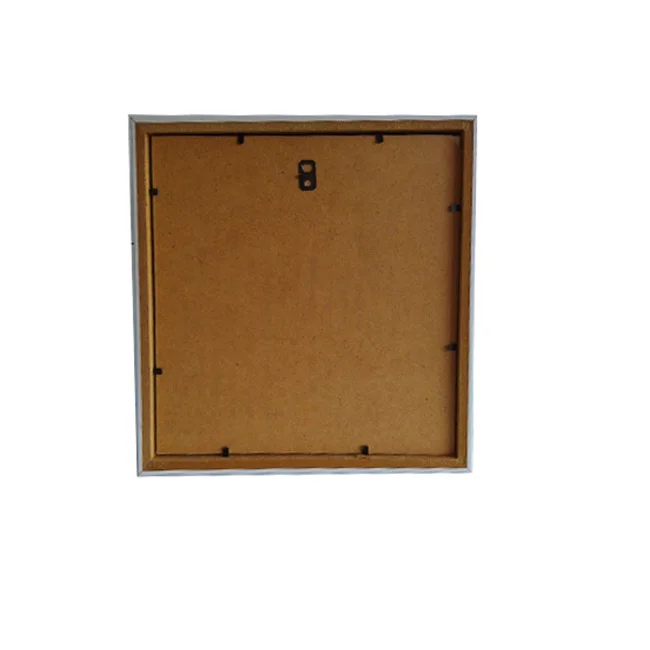 Back panel of a square photo frame made of MDF with a central metal hanging hook and secure clips.