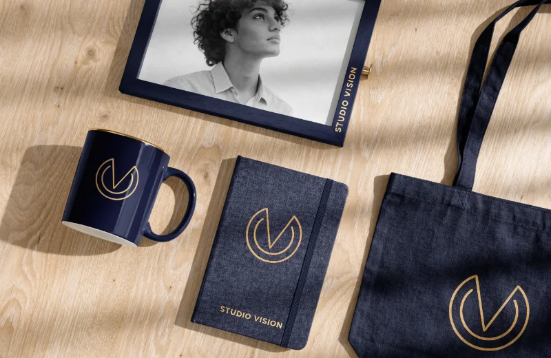 Using Custom Frames to Build Brand Value A branded custom photo frame next to the company's other branded products