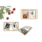 A wooden photo frame collage featuring two displayed layouts, one with two portrait images and the other featuring a single feather and a dog photo. Surrounding elements include illustration of red berries and green leaves.
