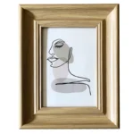 A wooden photo frame featuring minimalist line art of a woman's profile with neutral-toned abstract accents.