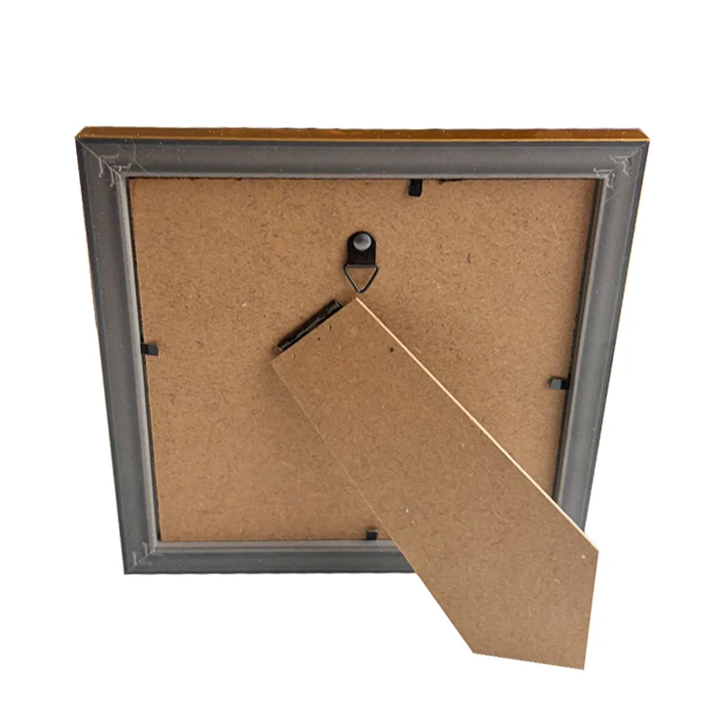 Back view of a rectangular photo frame with MDF backing, a wall mount hook, and an adjustable stand.