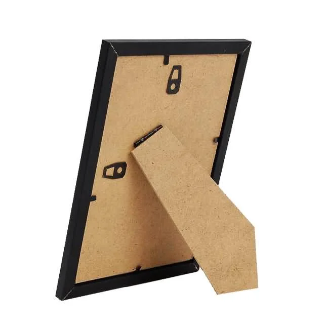 A back view of a black photo frame with a foldable support stand and wall-mounting hooks, showcasing its versatile design.