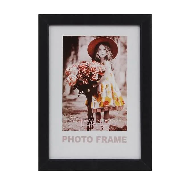 Black rectangular photo frame featuring a portrait of a young girl holding flowers, designed for stylish home decor.