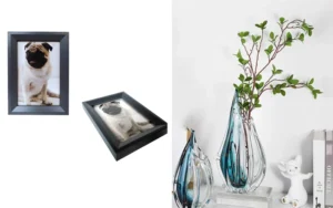 A black photo frame featuring a pug alongside elegant glass vases and green branches used as home decor on a white background.