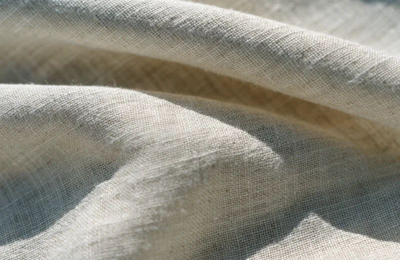 High-Quality Linen Fabric Macro shot of high-quality linen fabric showing its weave.