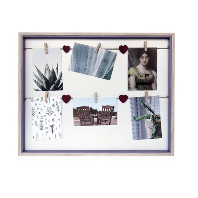 Wooden collage photo frame featuring decorative mini clothespins and red heart accents, displaying various photos and artworks.