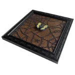 Black decorative photo frame with intricate details featuring a yellow butterfly placed on a black lace-patterned background.
