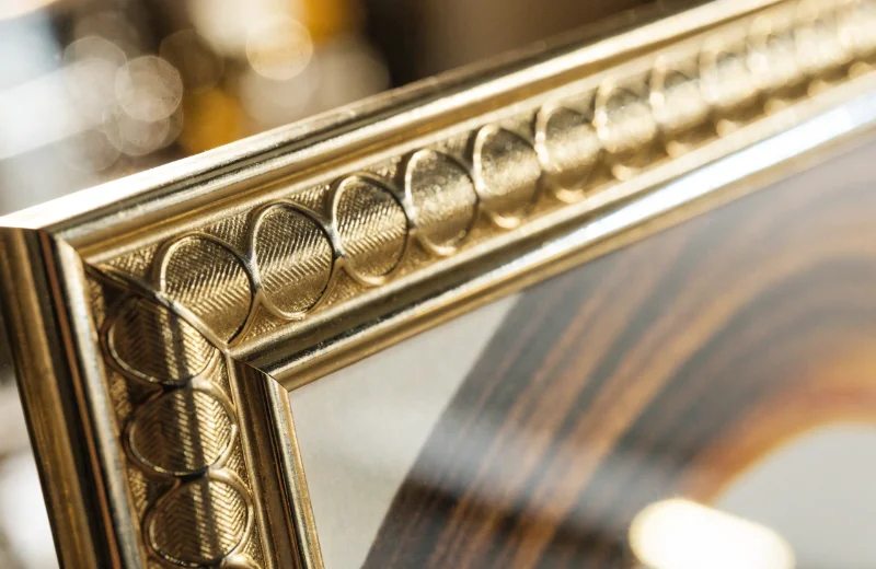 Exquisite Photo Frame Design Details A close-up shot of a photo frame with intricate details and a premium finish.