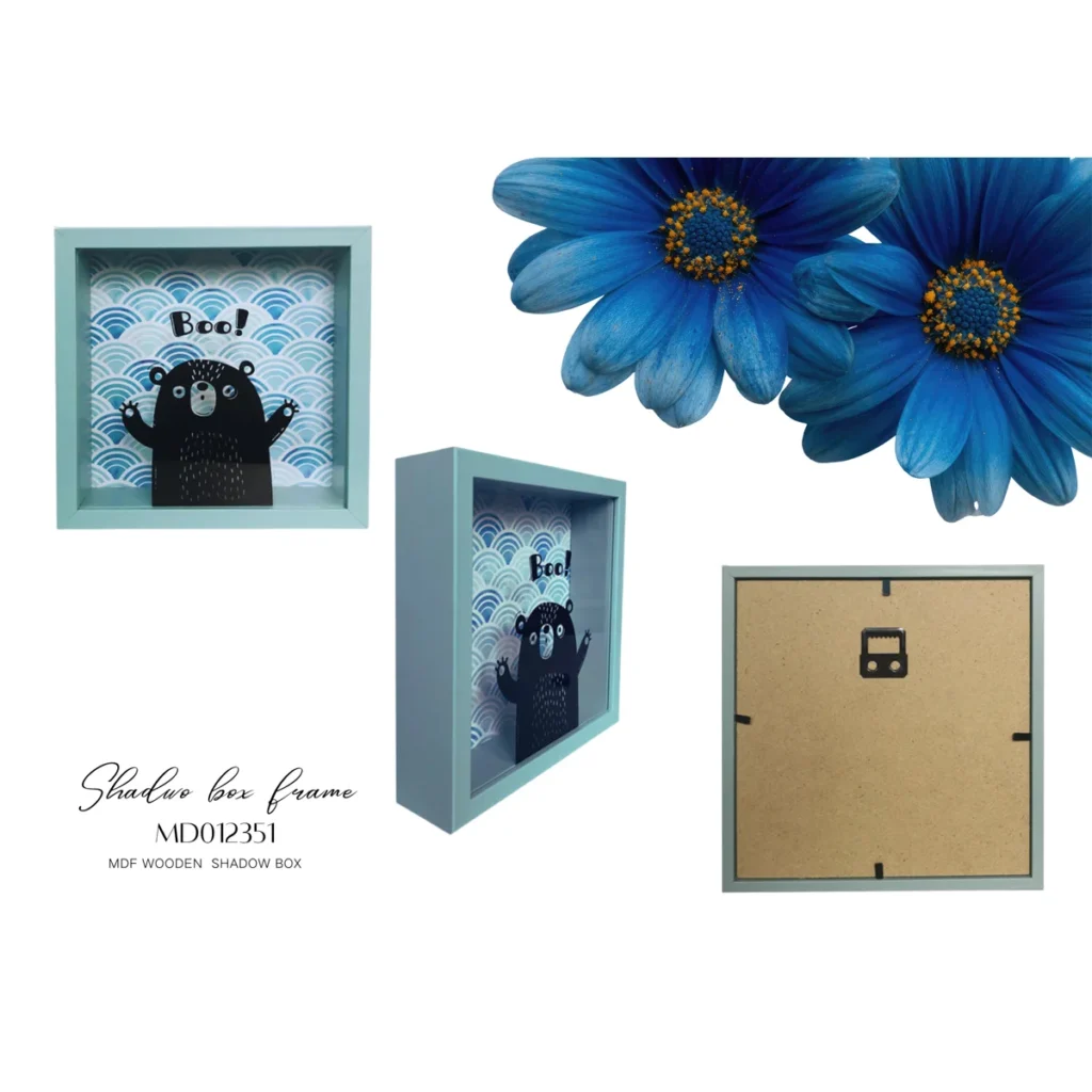 MDF wooden shadow box frame in light blue featuring a playful bear illustration with 'Boo!' text, seen from various angles.