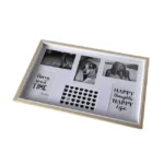 Sleek multi-photo collage frame with six slots featuring black and white photos and inspirational text, enclosed in a light wood border.