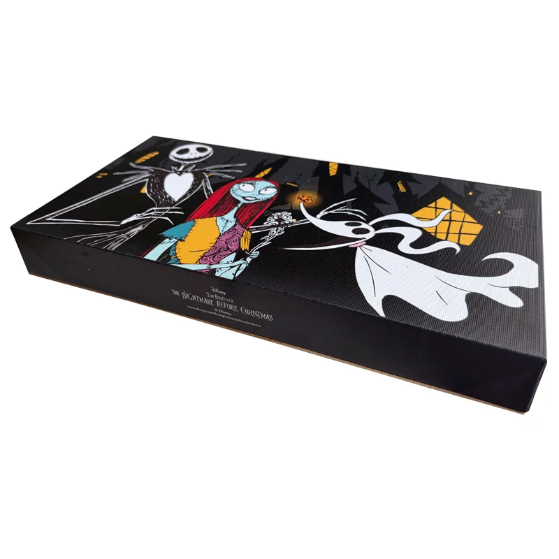 A rectangular 'The Nightmare Before Christmas' themed gift box featuring Jack Skellington, Sally, and Zero in a colorful design.