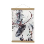 Wall hanging poster featuring a reindeer in a snowy forest, with a wooden frame and string for display.
