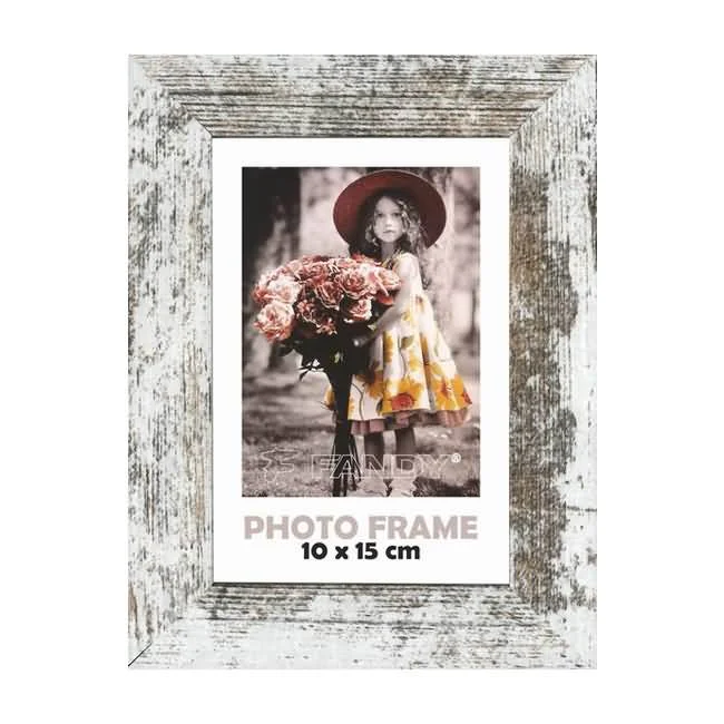 Rustic wooden photo frame with distressed white finish surrounding a 10x15 cm photo of a girl holding a bouquet of roses outdoors.