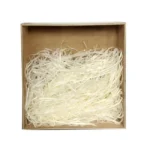 Light beige shredded paper neatly placed in a cardboard box, ideal for protective gift packaging or decoration.