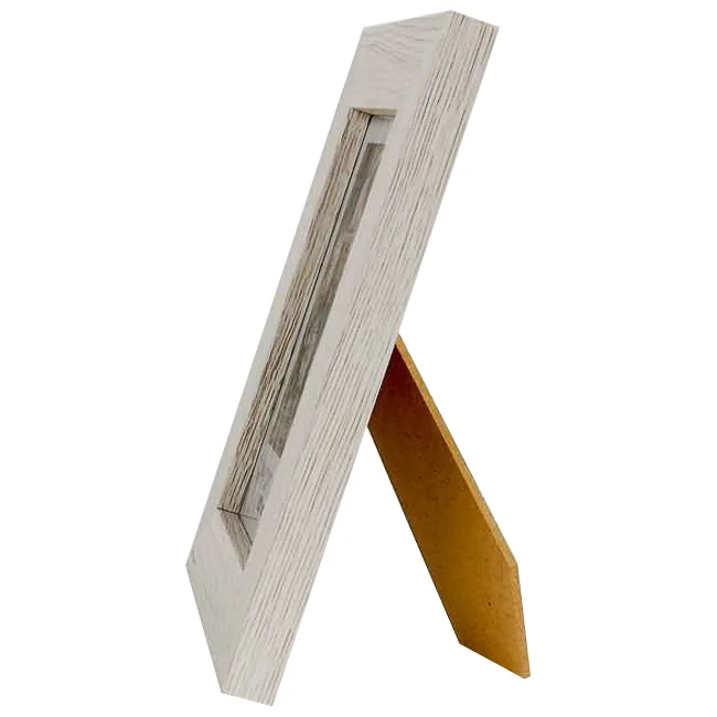 Side view of a white wooden photo frame with a textured finish, showing a sturdy MDF stand for tabletop display.