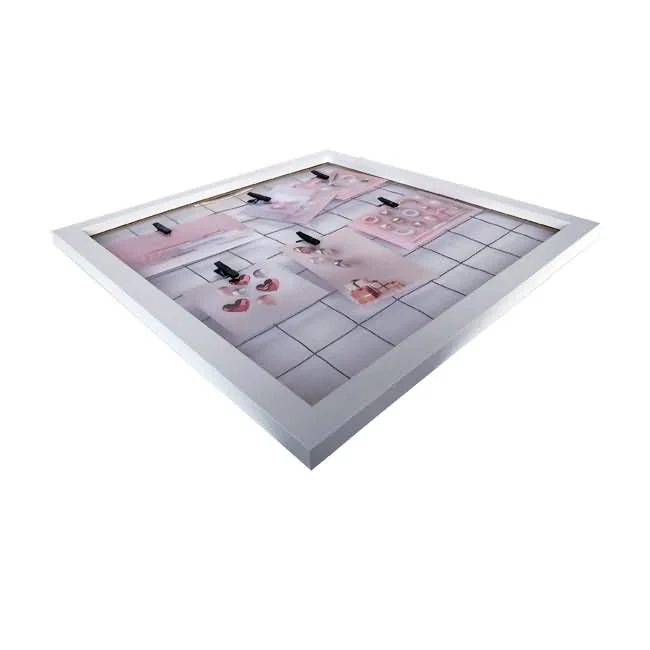 White photo frame with a grid design for photo and card display, featuring clips holding pastel-themed pictures.