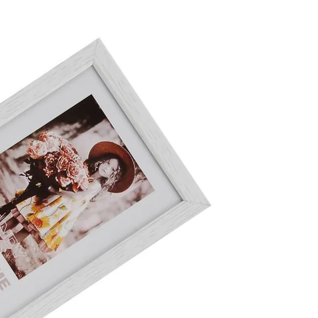 White rectangular photo frame with a decorative floral picture featuring a girl holding a bouquet and wearing a hat.