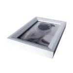 A classic white photo frame with a portrait of a pug, featuring a wide matte border and a sleek design.