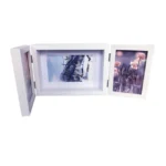 White trifold photo frame displaying three decorative images, including flowers and snowy scenery, ideal for home decor.