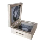 Open wooden display box with a transparent glass lid, light wood finish, and a cut-out slot on the front.