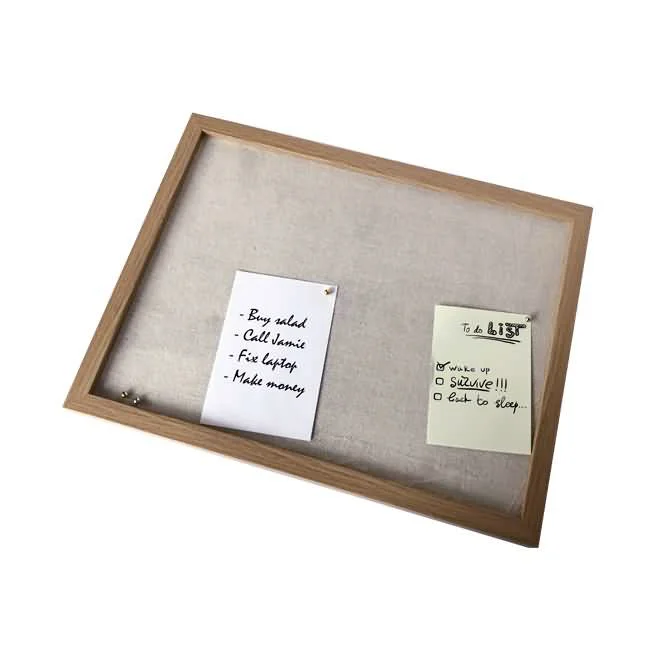 Wooden pinboard with a natural frame and two pinned notes on a beige background.