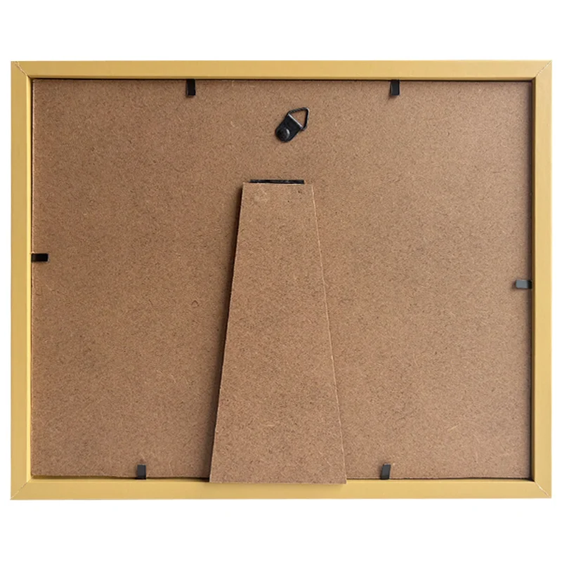 Back view of a wooden photo frame with a brown MDF backing, foldable stand, and hanging hardware.