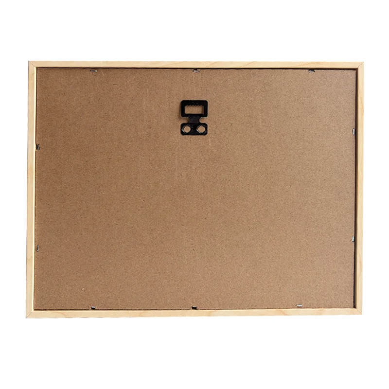 Backside of a rectangular wooden photo frame showing MDF backboard and attached hanging hardware for wall mounting.