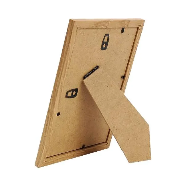 Back view of a wooden photo frame featuring secure hanging hooks and a stand for tabletop display.