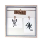 Square wooden photo frame with a light border and interior string lines holding decorative cards with clips. Displays 'Home' and inspirational messages.