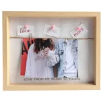 Rustic light wood photo frame with pinned love messages and a couple photo displayed, featuring a heartfelt message.