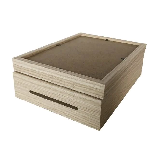 Wooden photo frame with a slot at the front, crafted from natural light wood, ideal for home or office décor.