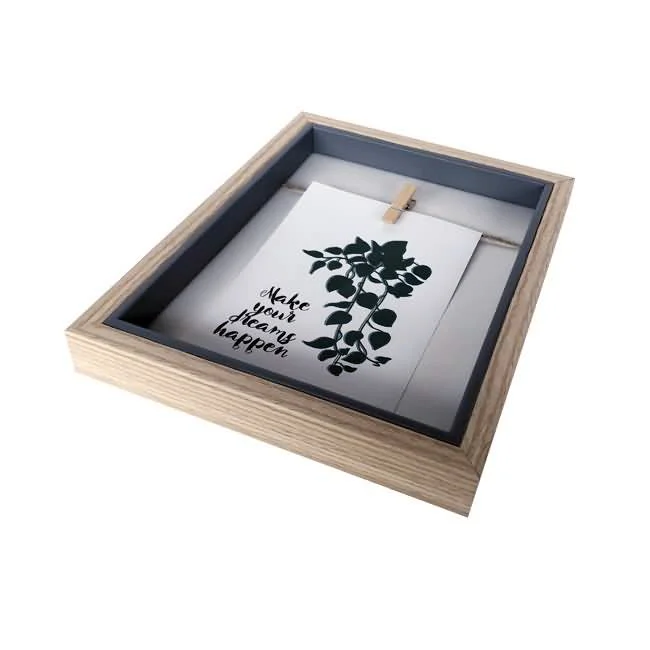 Elegant wooden shadow box photo frame holding an inspirational print with a leafy design and 'Make Your Dreams Happen' text.