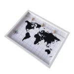 White rectangular photo frame with a black world map design, a grid background, and three mini clothespins for displaying photos.
