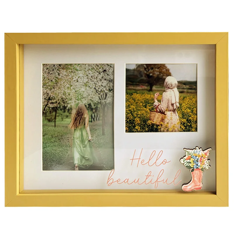 Yellow photo frame with two sections displaying scenic photographs and the text 'Hello Beautiful' written in cursive with a floral boot decoration.