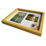 Yellow rectangular photo frame displaying two pictures with floral embellishments and the text 'Hello Beautiful'.
