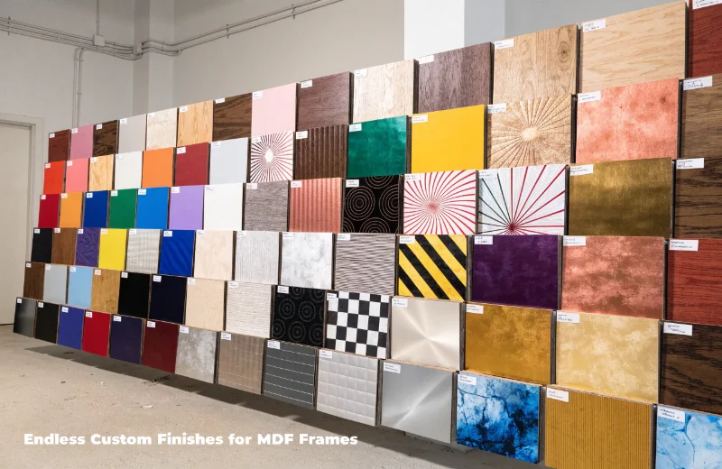 A wall showcasing dozens of different paper wrap finishes: various woods, colors, metallics, and patterns.